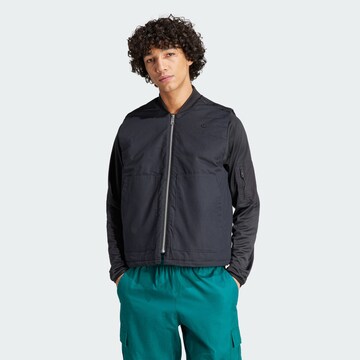 ADIDAS ORIGINALS - Chaleco en negro: frente