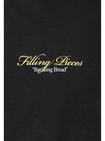 Maglietta 'Citrus' di Filling Pieces in nero