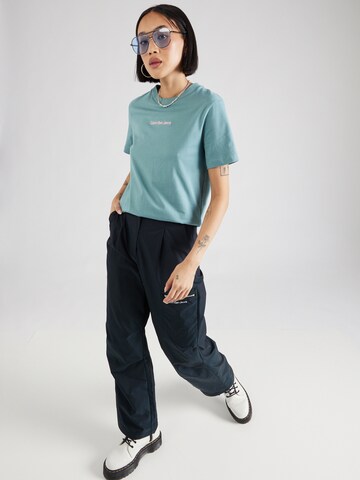 mėlyna Calvin Klein Jeans Marškinėliai 'INSTITUTIONAL'
