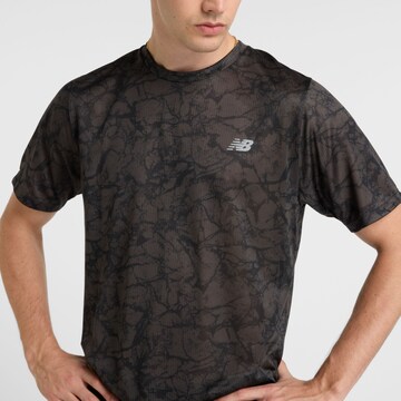 new balance Functioneel shirt 'Athletics' in Zwart