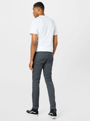 Carhartt WIP Slimfit Jeans 'Sid' in Grijs