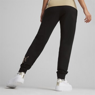 PUMA Tapered Sportbroek 'ESS+' in Zwart