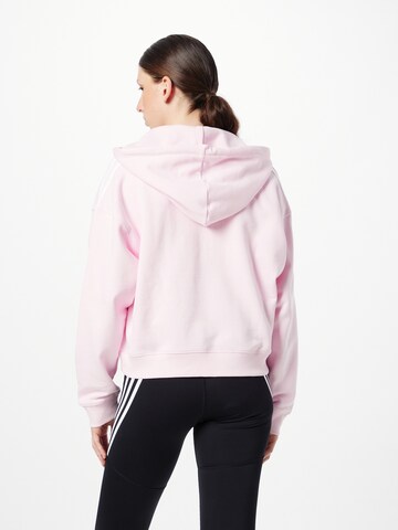 ADIDAS SPORTSWEAR Urheilullinen collegetakki 'Essentials 3-Stripes French Terry ' värissä vaaleanpunainen