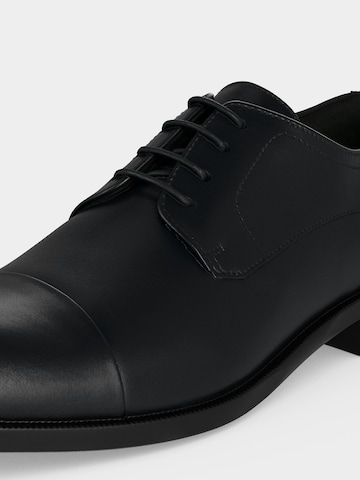 Scarpa stringata 'Tayil' di BOSS in nero