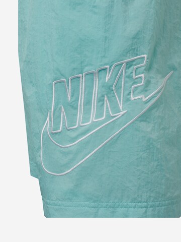 Nike Sportswear Szabványos Nadrág 'Alumni' - zöld