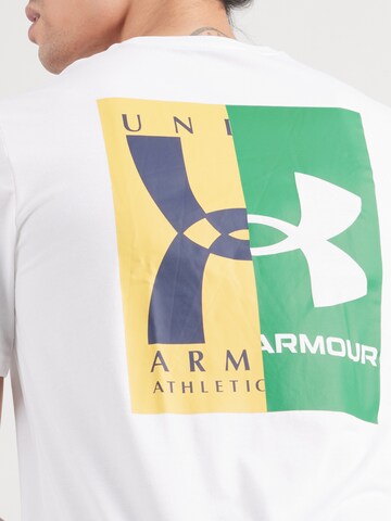 Tricou funcțional de la UNDER ARMOUR pe alb