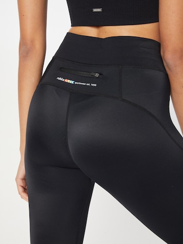 Skinny Pantalon de sport Rukka en noir