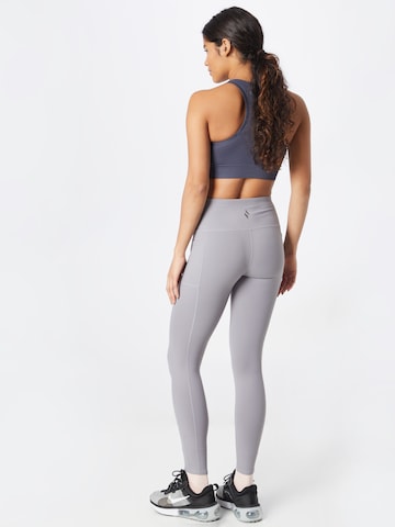 SKECHERS Skinny Sportbroek in Grijs