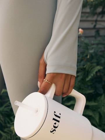 Cardigan self. en vert