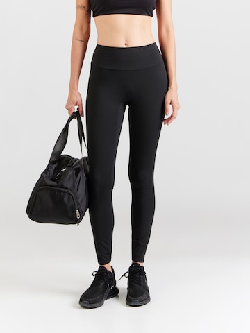 Skinny Pantalon de sport Fabletics en noir : devant