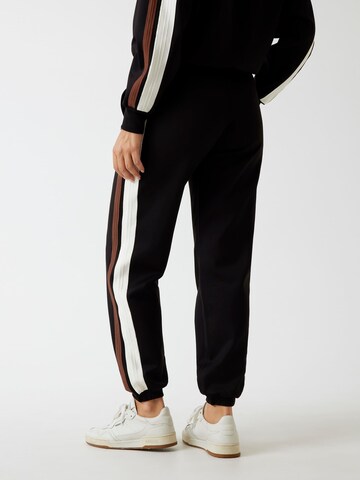 GUESS Tapered Broek in Zwart