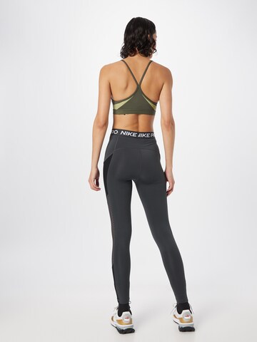 NIKE Skinny Workout Pants in Grey