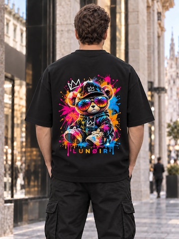 LUNØIR Studio Póló 'Tropical Riot – Sunset Teddy' - fekete