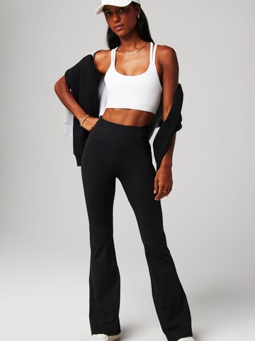 Fabletics Regular Hose `OASIS HIGH-WAISTED KICK FLARE` in Schwarz