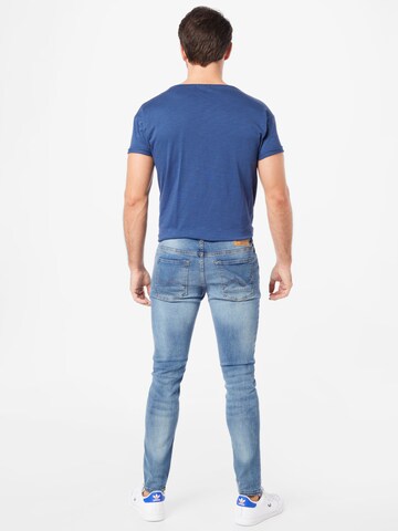 Coupe slim Jean Petrol Industries en bleu