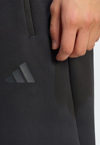 ADIDAS SPORTSWEAR - Pierna ancha Pantalón deportivo 'Z.N.E.' en negro