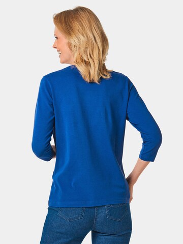 Goldner Shirt in Blau