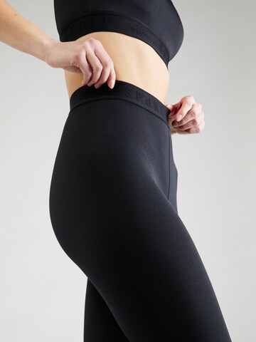 Skinny Pantaloni sportivi di 4F in nero