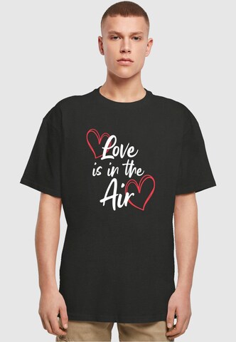 Merchcode T-Shirt 'Valentines Day - Love is in the Air' in Schwarz: Vorderseite