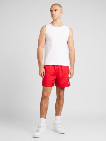 Nike Sportswear Ohlapna forma Hlače 'CLUB' | rdeča barva