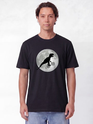 T-Shirt 'Flying TRex' Watapparel en noir : devant