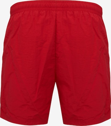 Regular Pantaloni de la Karl Kani pe roșu