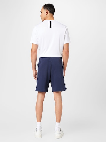 ADIDAS SPORTSWEAR Regularen Športne hlače 'Essentials' | modra barva