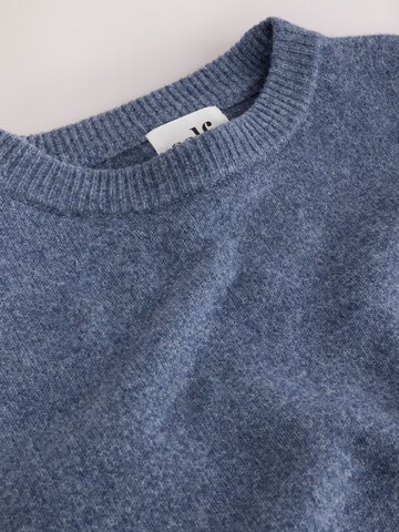 Pull-over self. en bleu