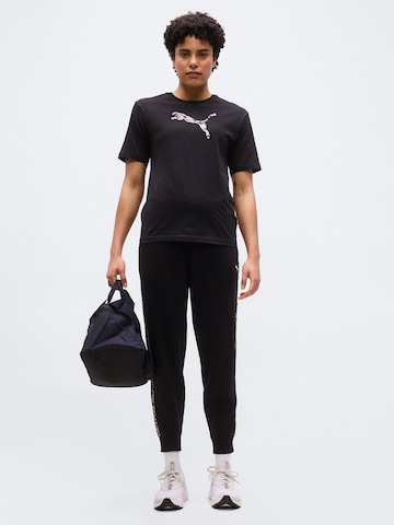 PUMATehnička sportska majica 'ESS' - crna boja