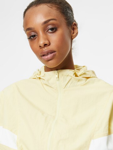 Urban Classics Between-season jacket 'Crinkle Batwing' in Yellow