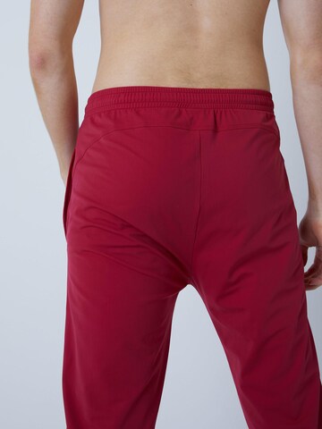 Coupe slim Pantalon de sport 'Slim Training Pants' SPORTKIND en rouge