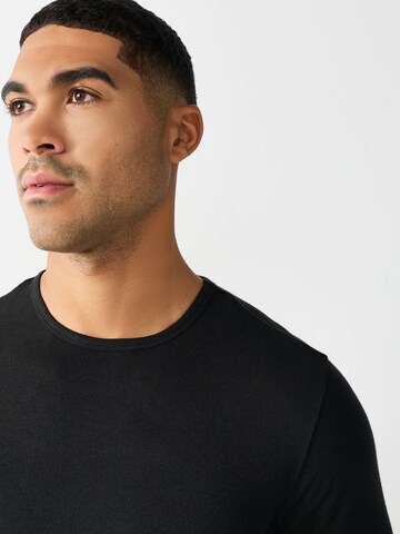 juoda Next Apatiniai marškinėliai