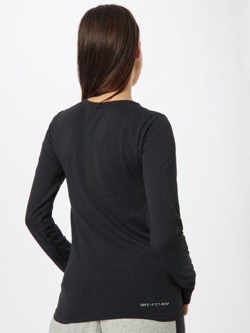 NIKE Sportshirt 'Aura' in Schwarz