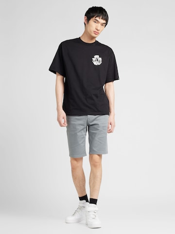 VANS - Camiseta 'CIRCLE' en negro