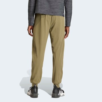 ADIDAS PERFORMANCE Tapered Workout Pants in Green