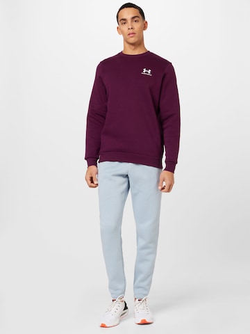 UNDER ARMOUR Sports sweatshirt in Purple