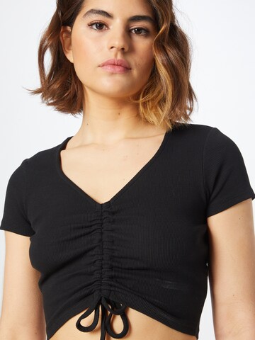 ONLY - Camiseta 'MIA' en negro