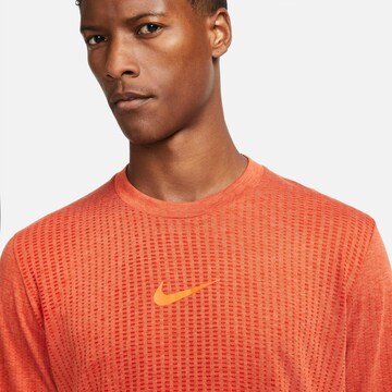 NIKE Funktionsshirt in Orange