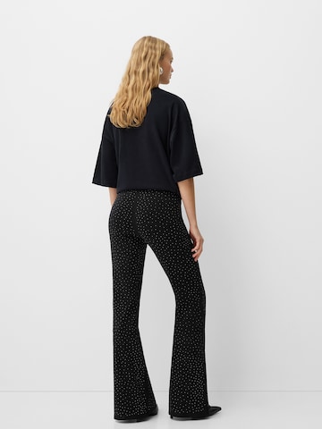 Flared Pantaloni di Bershka in nero