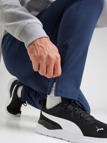 PUMA Tapered Workout Pants 'FLEX' in Blue