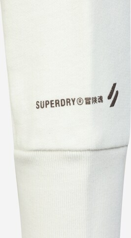 balta Superdry Sportinio tipo megztinis