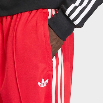 ADIDAS ORIGINALS Loose fit Athletic Pants in Red
