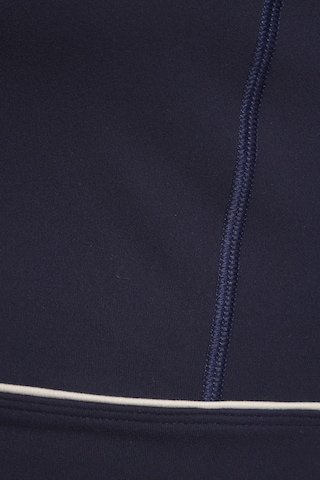 Top di Copenhagen Studios in blu