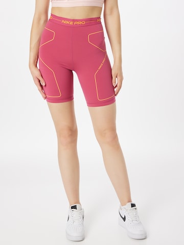 Skinny Pantaloni sport de la NIKE pe roz: față