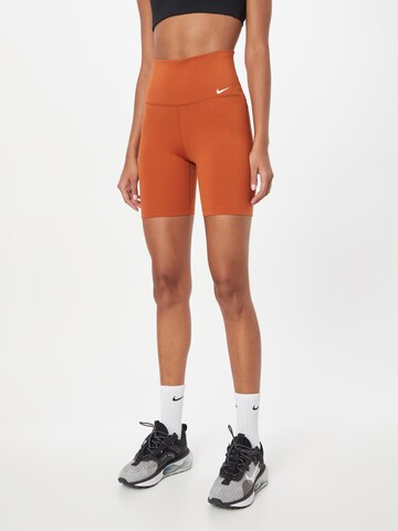 NIKE Skinny Workout Pants 'ONE' in Orange: front