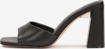 Kazar Studio Mules in Black: front