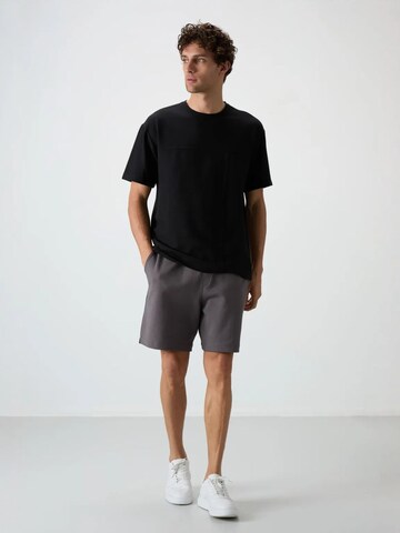 Tommy Life T-Shirts in Schwarz