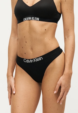 Calvin Klein Underwear - Tanga em preto: frente