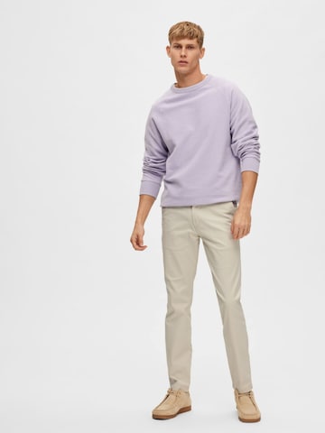 Slimfit Pantaloni '16087663' di SELECTED in beige