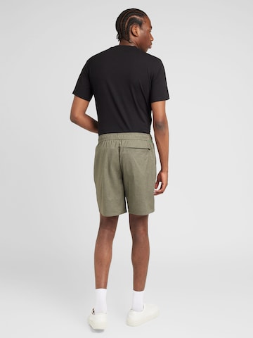 Regular Pantaloni outdoor 'Redmont' de la VAUDE pe verde